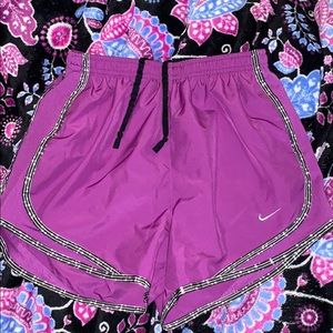 purple, white and black nike shorts
